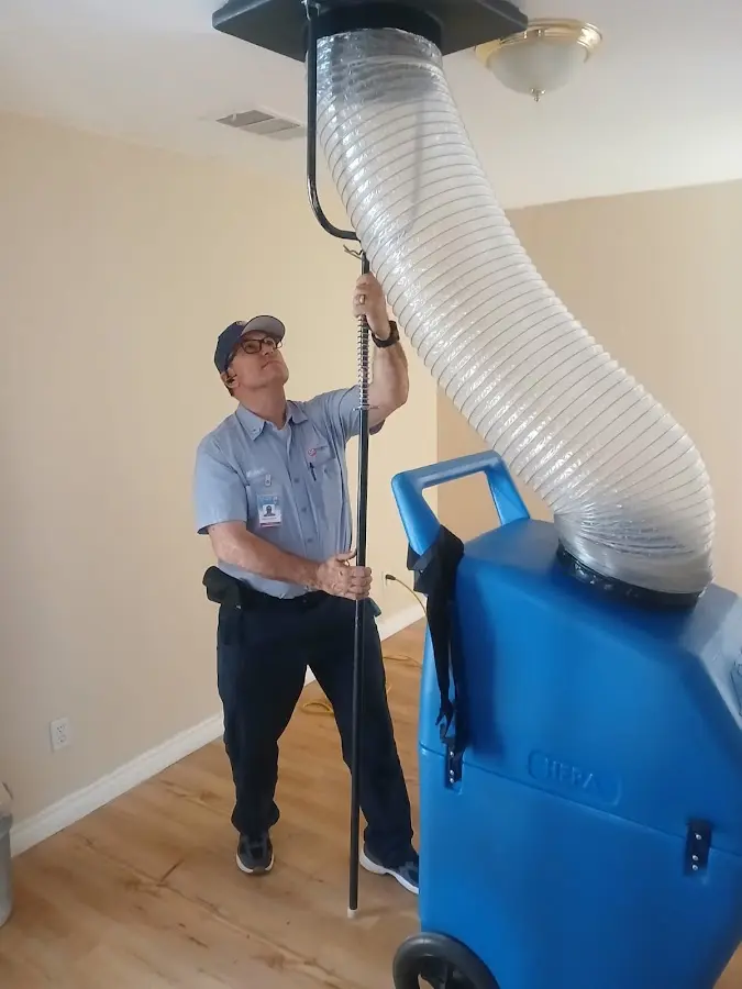 HVAC Installation technician using HEPA equipment in Falls
